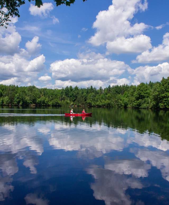 kayaking on the lake during the summer