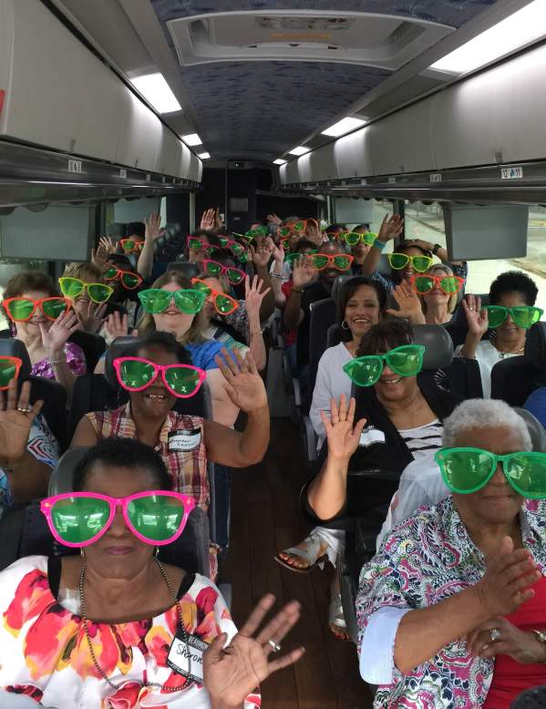 Attendees on Beaumont tour bus