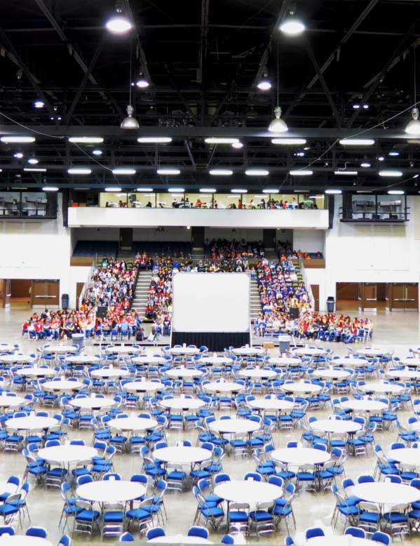Beaumont Civic Center Stage With Rows Of Round Tables