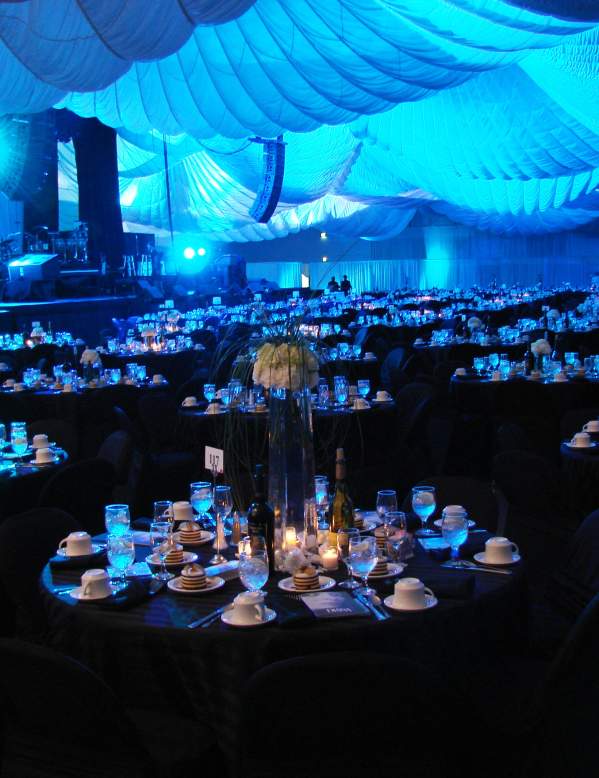 Ballroom set up with tables, candles and wine at the Beaumont Civic Center