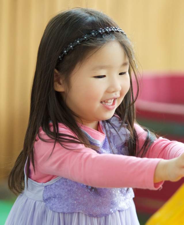 A child playing with an exhibit at the We The Curious in Bristol - credit Daniel Watkiss