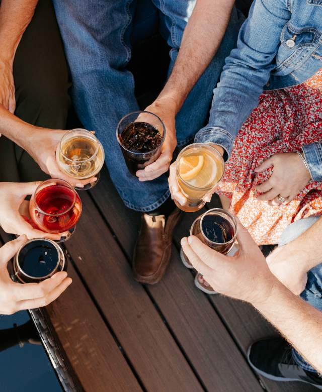 Toasting Drinks at the Brewery