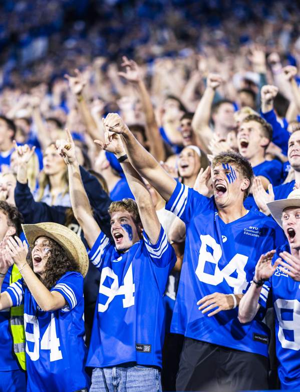 BYU student section cheering in the crowd, similar energy and crowd excitement expected at First Down Provo