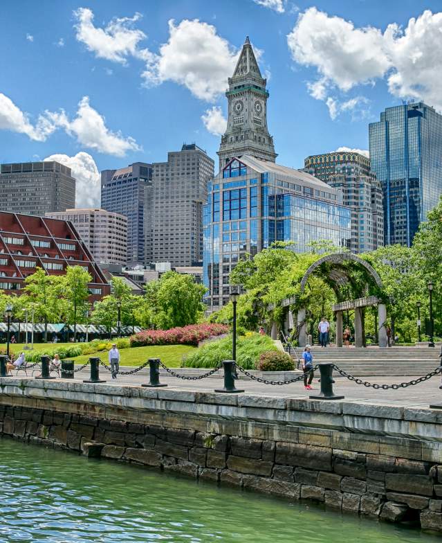 Columbus Park from view on the water, with Boston skyline in background