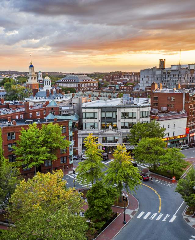 Sunset over buildings that make up Harvard Square