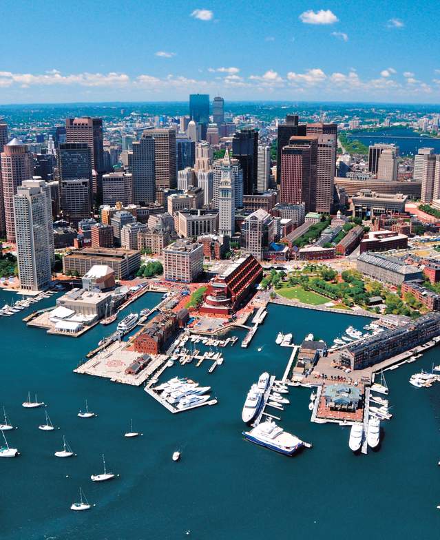 Aerial view of Boston including waterfront with boats