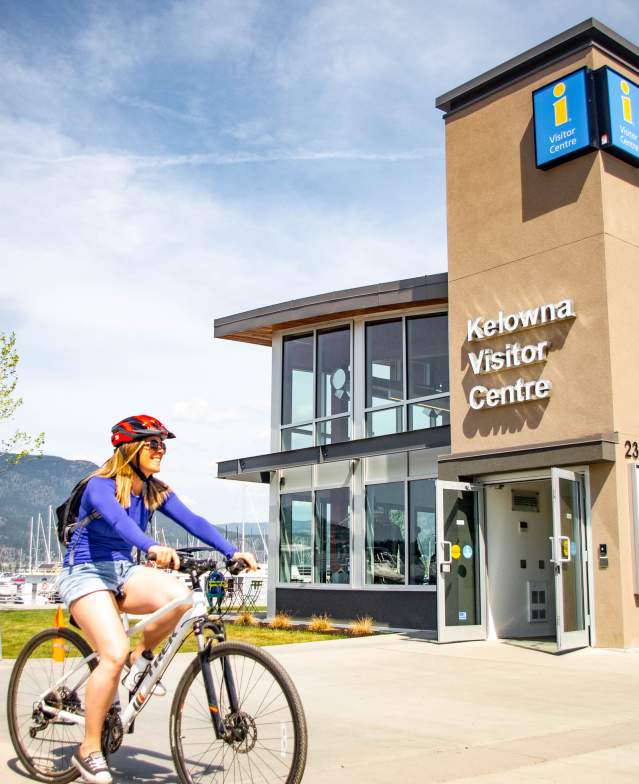 Biking by the Kelowna Visitor Centre
