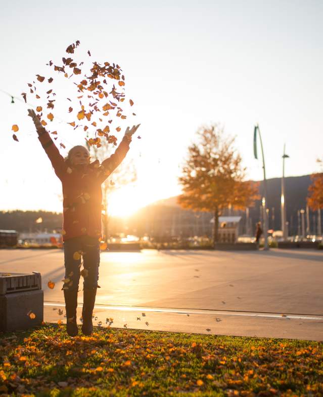 Girl Throwing Leaves - Stuart Park