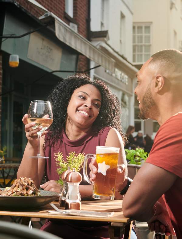 Casual couple dining alfresco