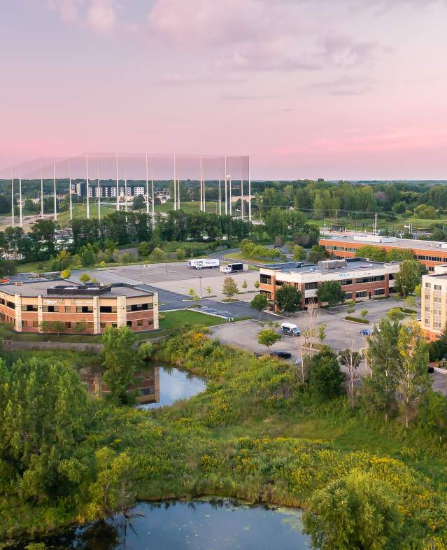 Aerial photo of Topgolf structure and hotels and local businesses in Woodbury.