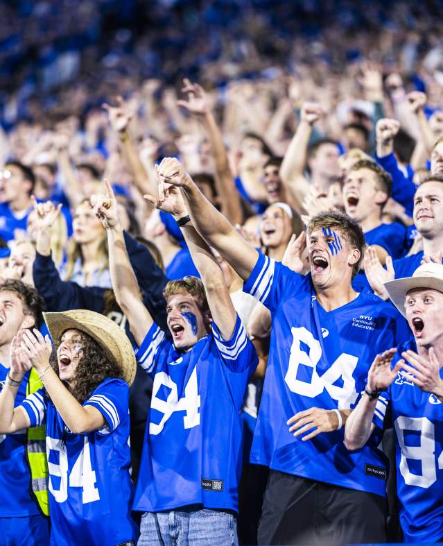 BYU student section cheering in the crowd, similar energy and crowd excitement expected at First Down Provo