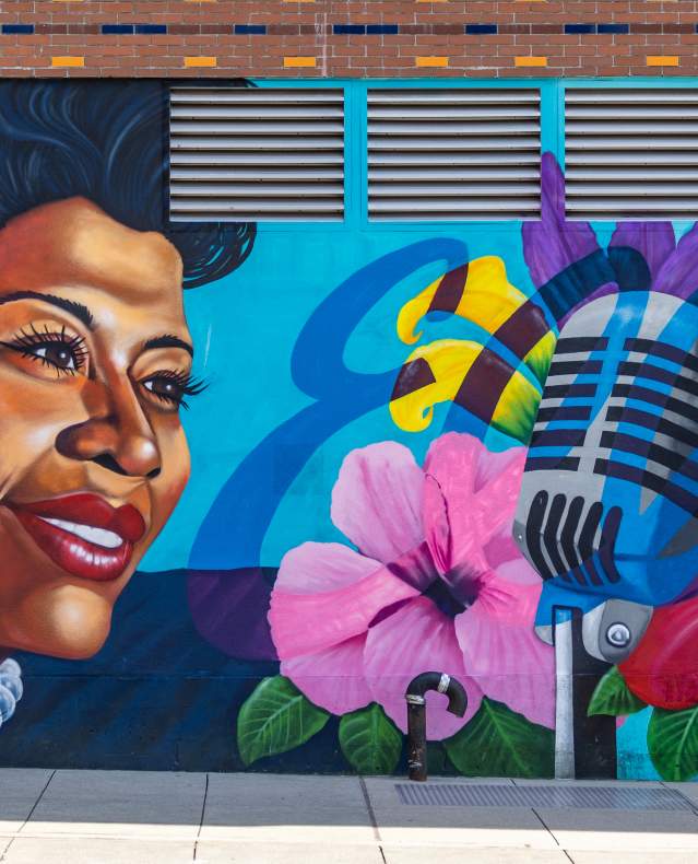 A brightly painted mural of Ella Fitzgerald adorns a wall in Yonkers.