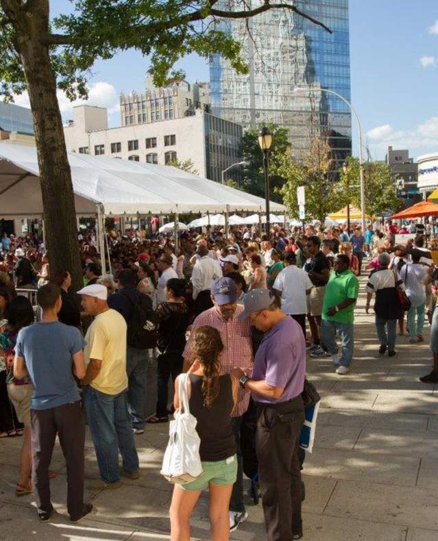 A crowd attends an event in downtown White Plains.