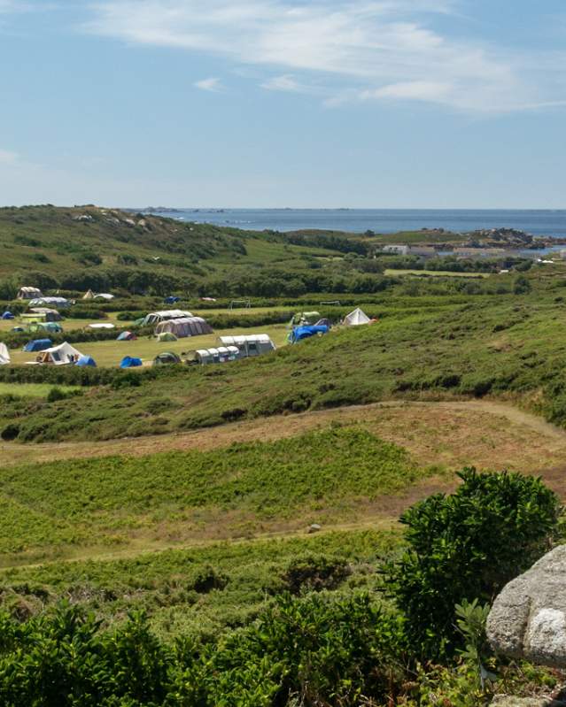 IOS Gallery - stay - camping - cool camping in 2021 - girl on Bryher rock 1750x849