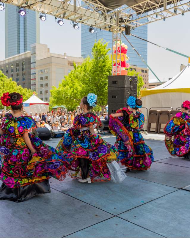 Little girls in beautiful dresses dancing on stage at the Festival of the Arts