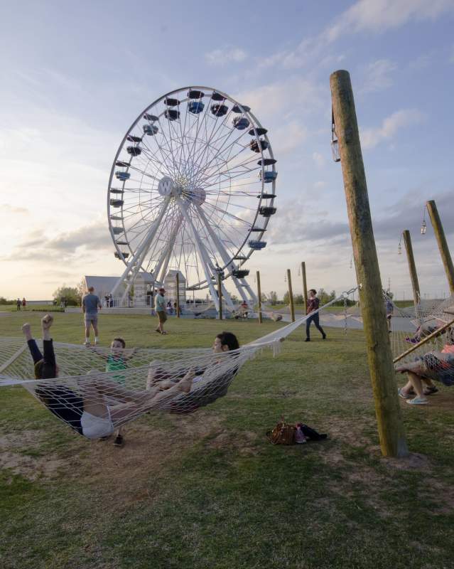 People hanging out in hammocks in OKC's Wheerler District