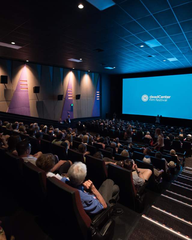 Movie theater full of people showing a film from OKC's deadCenter Film Festival