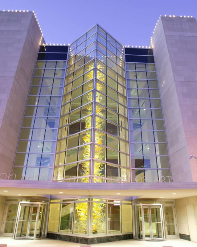 Exterior of the Oklahoma City Museum of Art featuring the multi-story Chihuly glass sculpture in the entry way