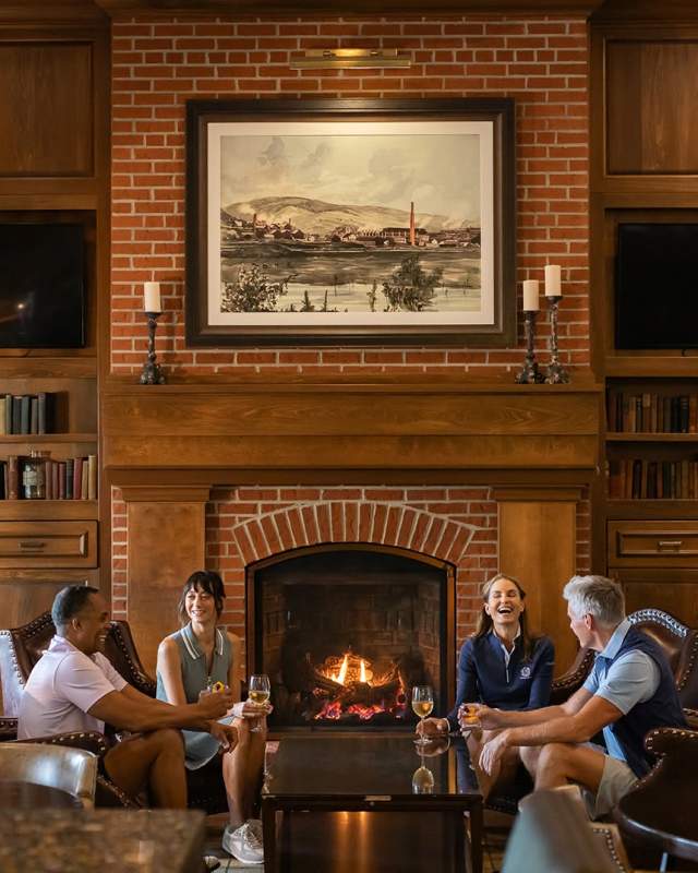 couples around a cozy fireplace