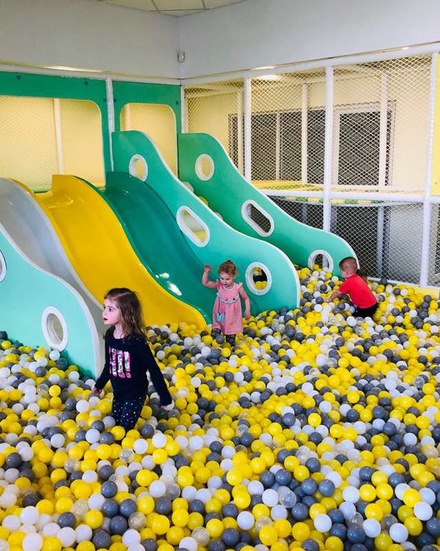 Little Girl In A Ball Pit At Momi Land