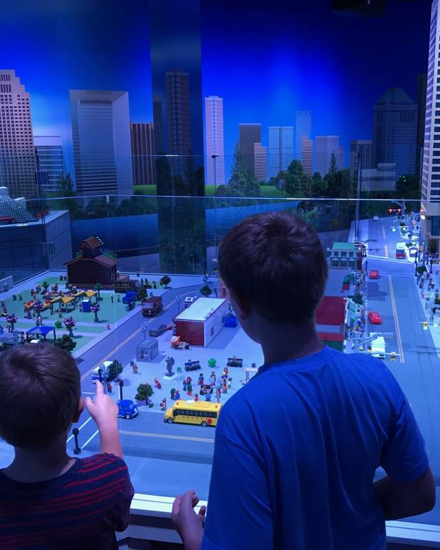 Two boys admiring re-creation of Columbus made completely of Lego bricks at LEGOLAND Discovery Center