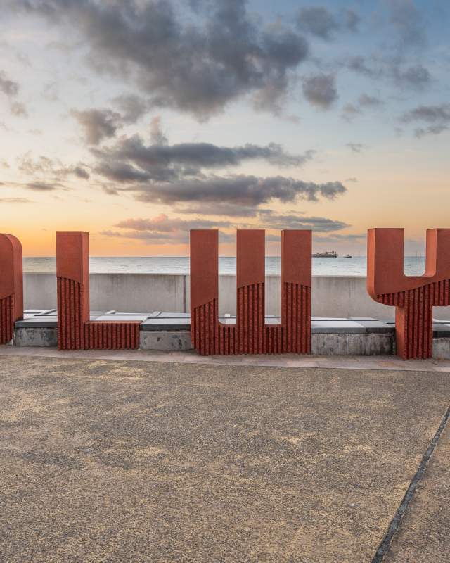 Colwyn Bay sign sitting on the promenade