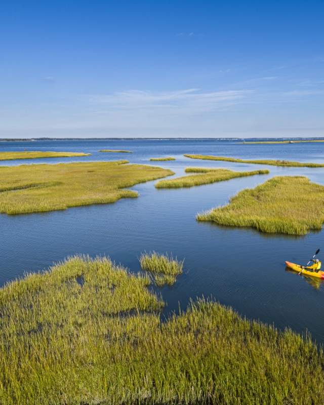 Kayaker in the marshlands of Woodland Beach