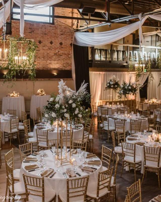 The Rose Event Center set up for a wedding with tables and decorations