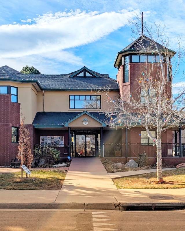 The front of the Golden Welcome Center two story building from Washington Ave.