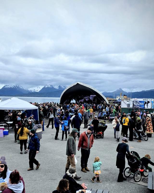 Crowds of people at the Deep Water Dock enjoying vendors and music at the 2025 Homer HarborFest.
