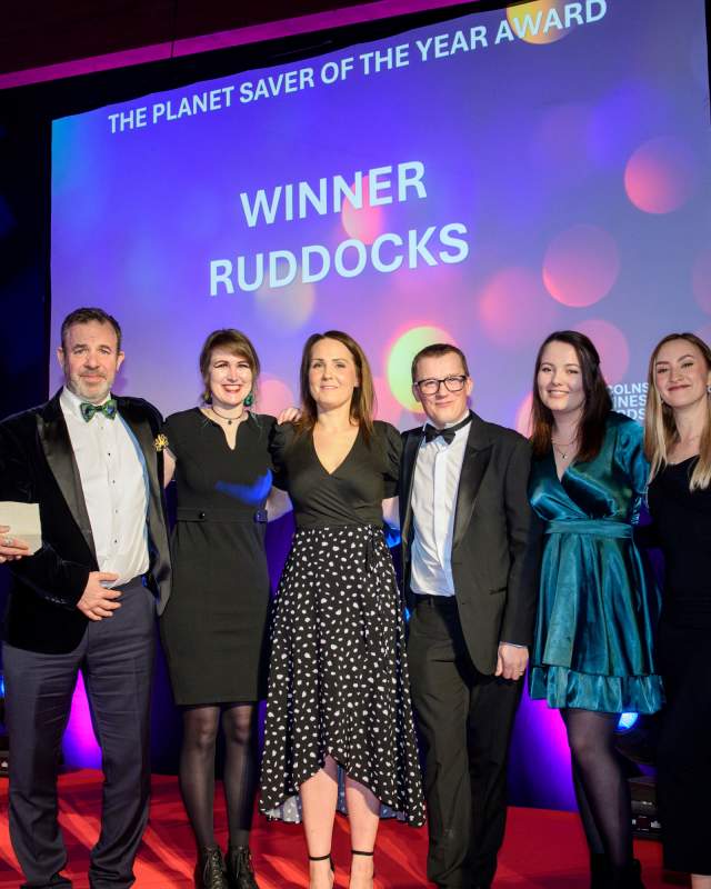 A team of people recieving an award.