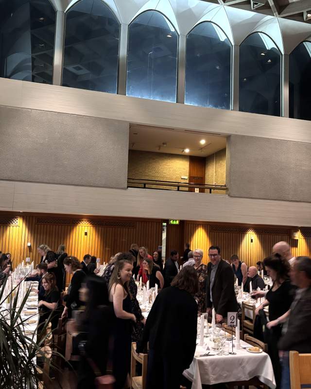 Delegates waiting to sit for their formal dinner at Fitzwilliam College
