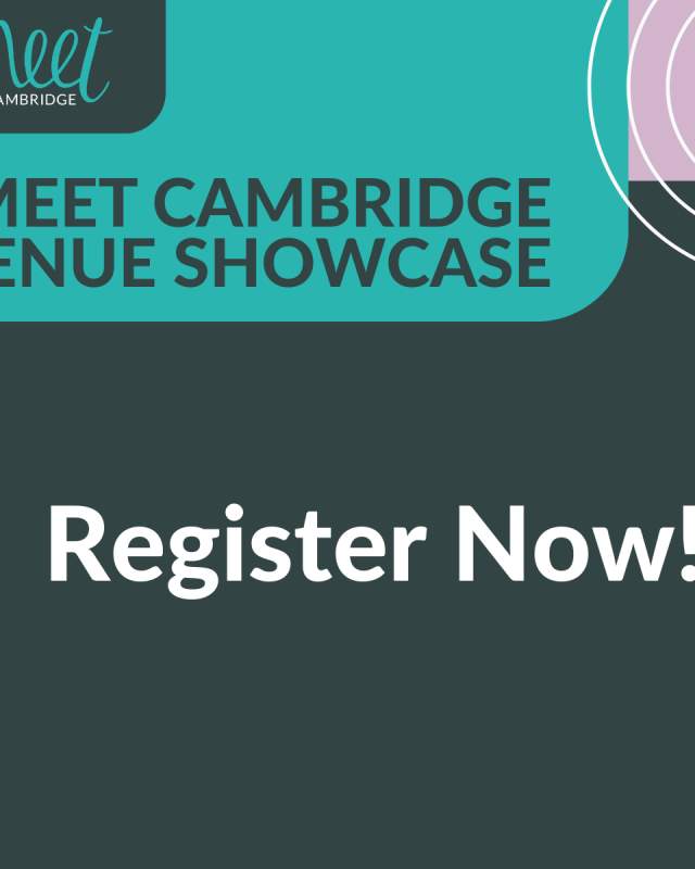 Delegates at an event talking to exhibitors around the room