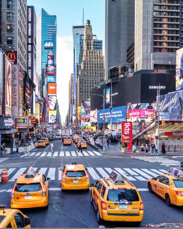 Busy street in New York city with taxi cabs