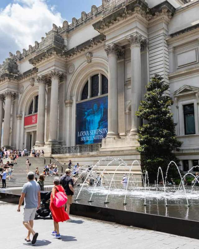 People gathered on the steps of the Metropolitan Museum of Art, the iconic Met Gala setting