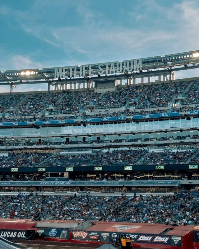 Packed crowd inside MetLife Stadium in East Rutherford New Jersey under evening lights selected as the host venue for the FIFA World Cup 2026 Final