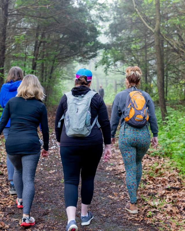 Women hiking in the woods at blue marsh lake
