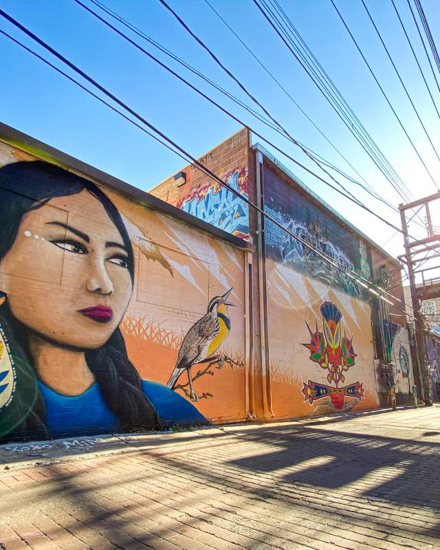 Image of Native American woman art on Art Alley walls in Rapid City, South Dakota