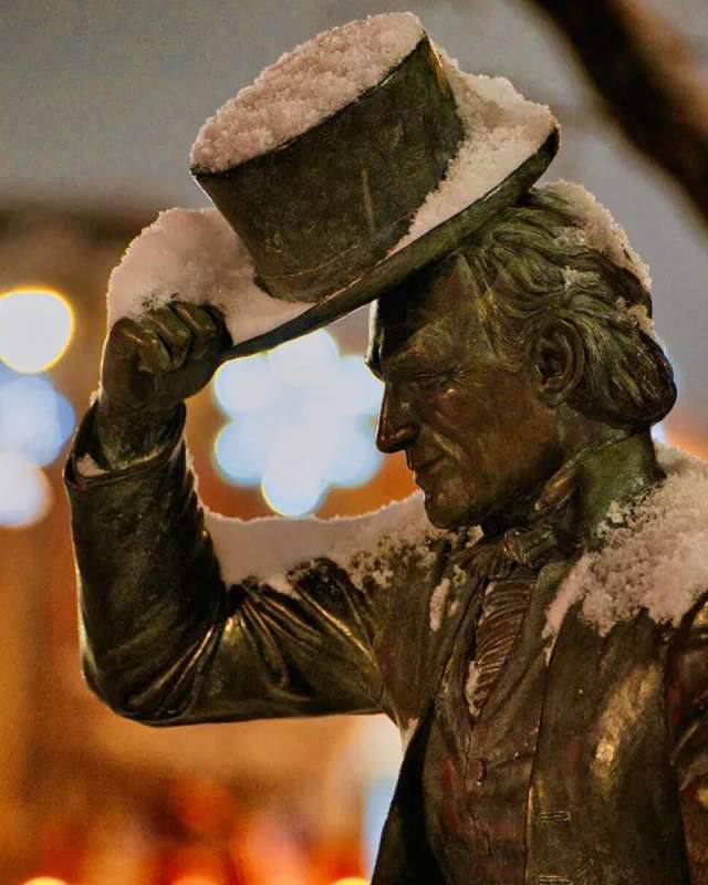 City of presidents statue covered in snow in downtown rapid city, south dakota