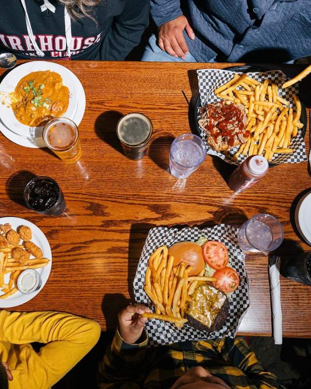 Overview of a table full of food from the Firehouse Brewing Company Menu in Rapid City, South Dakota