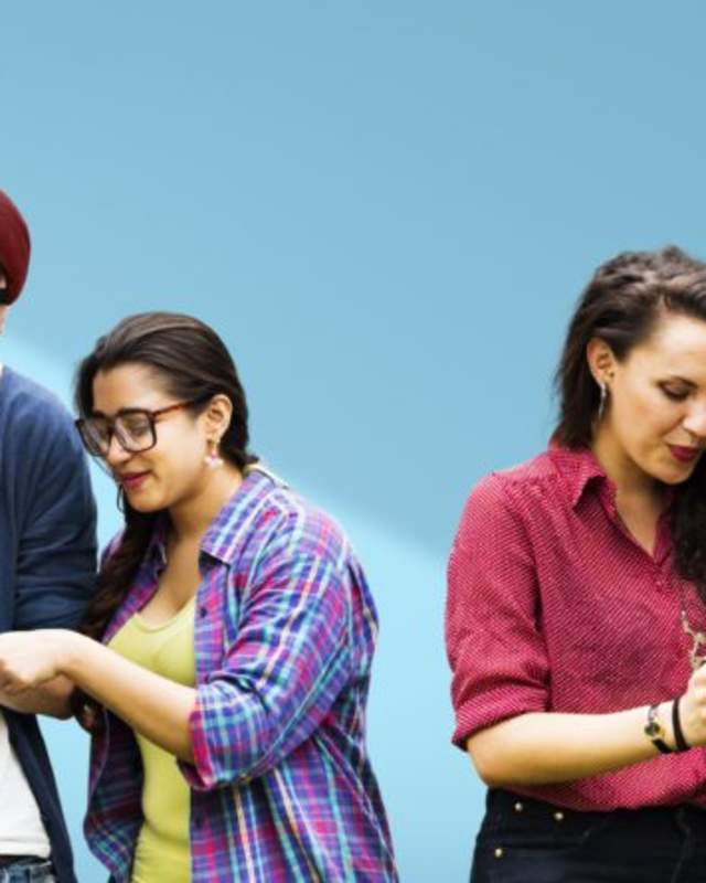 People looking at devices