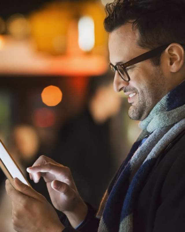 Man holding tablet