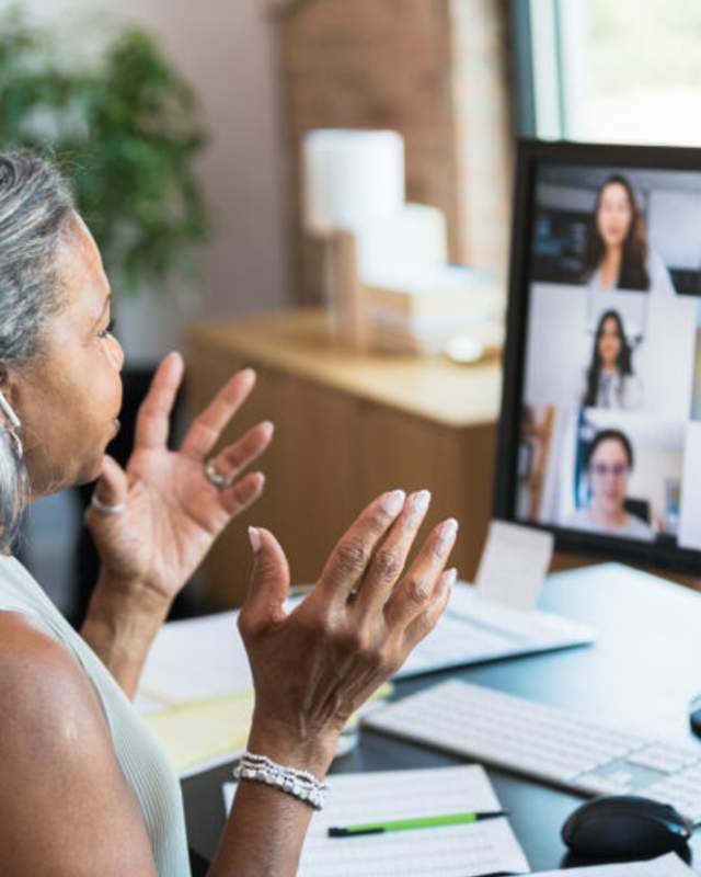 woman attending virtual meeting