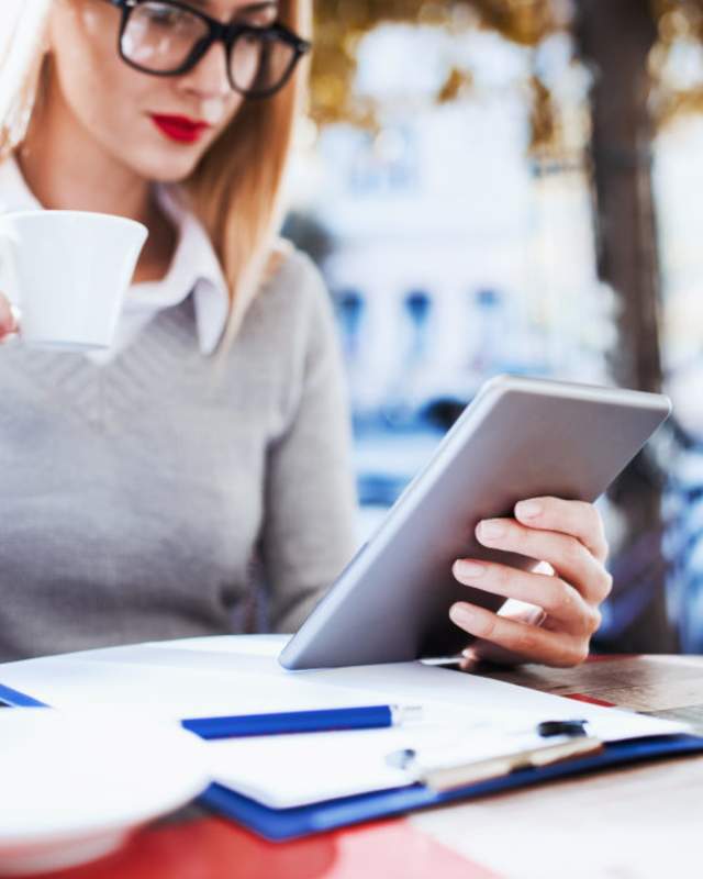 woman using tablet