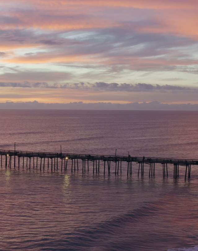 drone pier sunrise fish