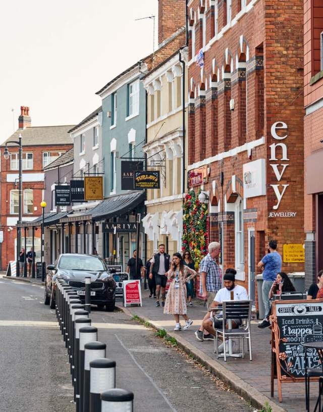 Shops and cafes along the side of a street in the Jewellery Quarter in Birmingham