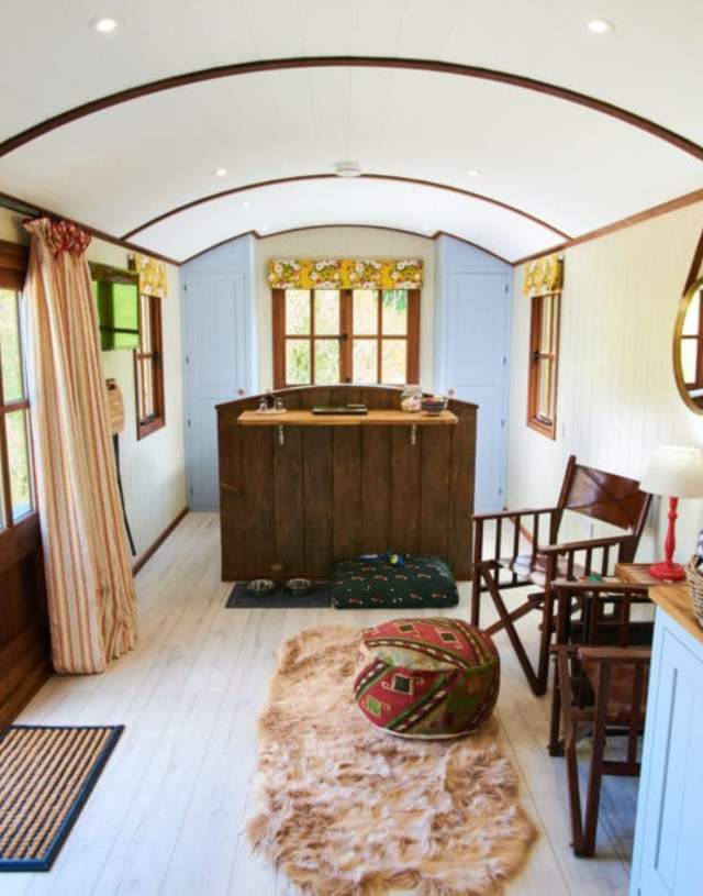 inside of a Shepherd's cabin bed and benches