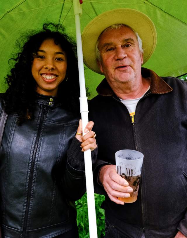 Two people under umbrella at Jazz Fest Sidmouth