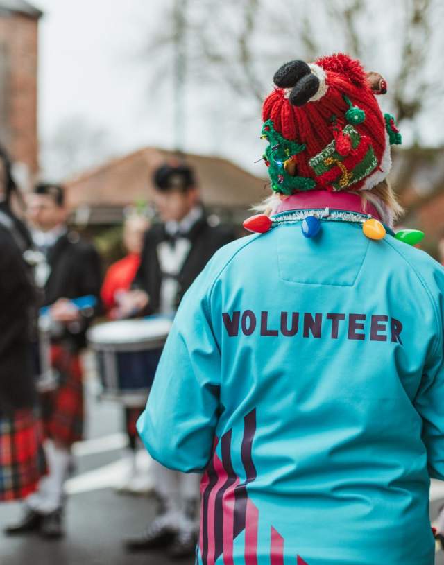 a HEY volunteer walking in the parade at the Beverley Festival of Christmas