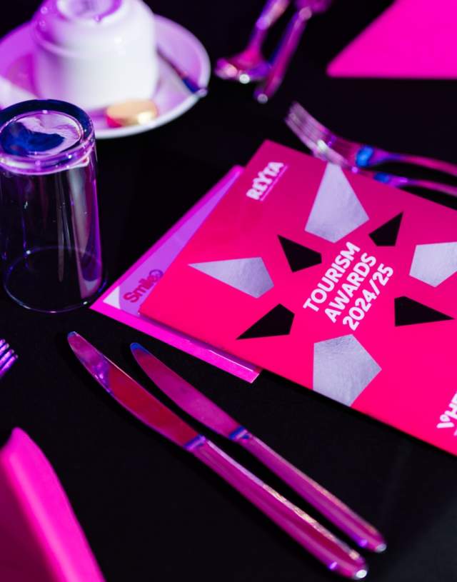 A table setting at the REYTAs including cutlery, drinkware and REYTAs 2024/25 programme